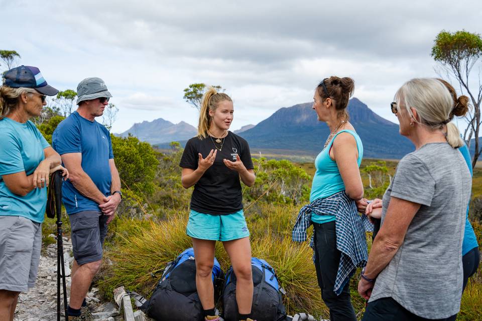 Guests listening to guide