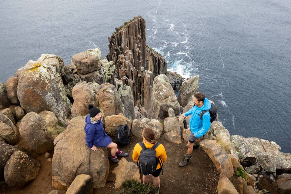 Guests standing on cliff