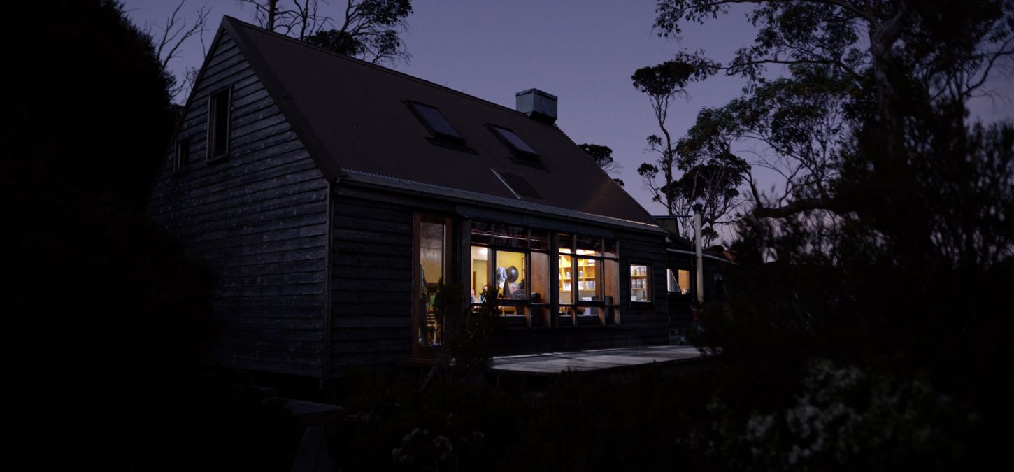 Cradle Mountain Huts Accommodation night time huts