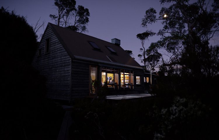 Cradle Mountain Huts Accommodation night time huts