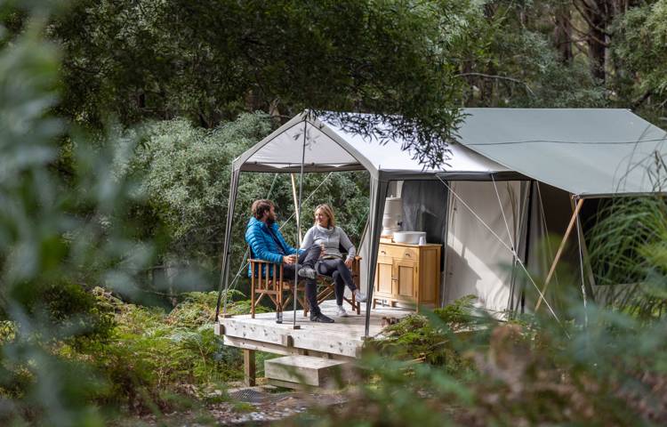 Guests sitting in tent at Bruny Island Campsite